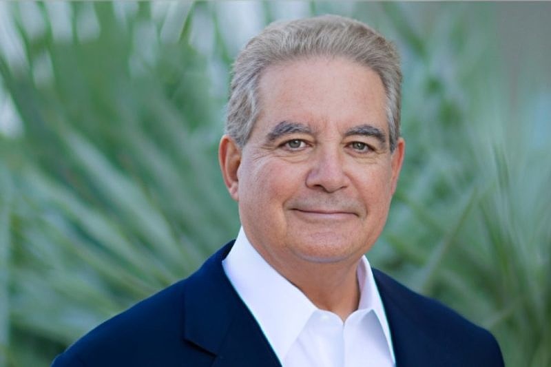 Bill Isaac had been chairman of Sarasota Private Trust.
