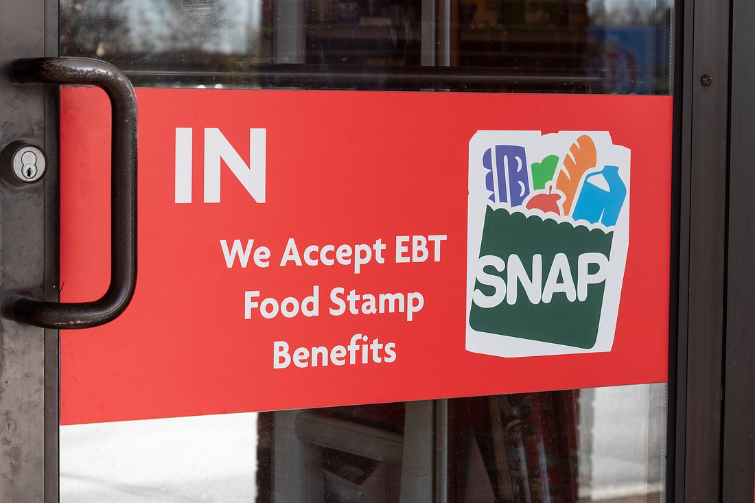 Every county in the region has posted a drop in food stamps in the past 12 months.