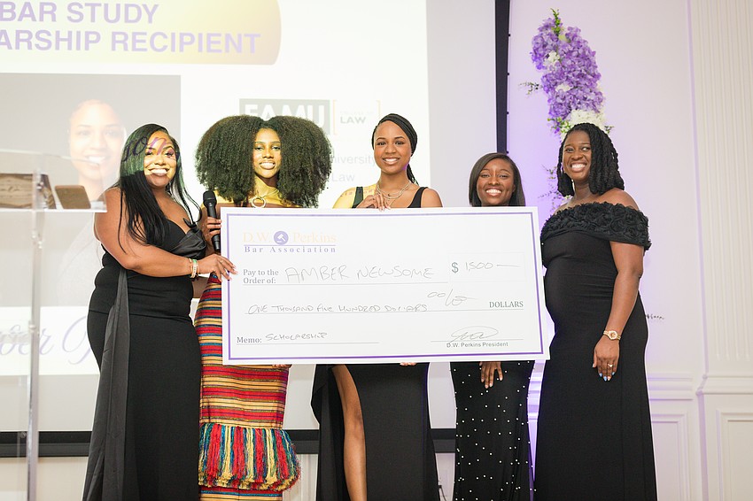 From left: Jo’anna Clayton, Lauren Fisher, 2026 scholarship recipient Amber Newsome, 2026-27 D.W. Perkins Bar Association President Vivian Williams and 2025-26 DWP President Naphtalie Azor.