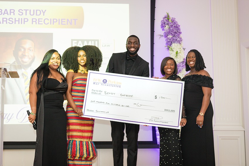 From left: Jo’anna Clayton, Lauren Fisher, 2026 scholarship recipient Bengy Baptiste , 2026-27 D.W. Perkins Bar Association President Vivian Williams and 2025-26 DWP President Naphtalie Azor.