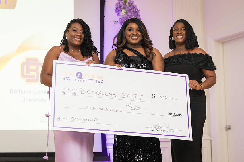 From left: D.W. Perkins Bar Association Immediate Past President Kimberley Leonard, scholarship recipient Brooklynn Scott, 2026-27 DWP President Vivian Williams and DWP 2025-26 President Naphtalie Azor.