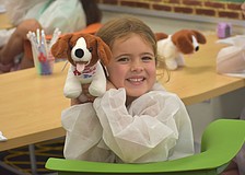 Sienna Linn, a rising first grader at Lakewood Ranch Preparatory Academy, says she has no pets at home but has had a blast with her dog, Mia, at the Little Vet School camp.