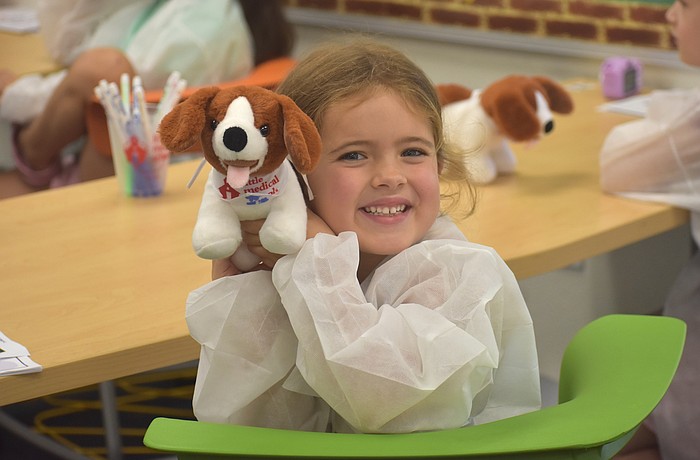 Sienna Linn, a rising first grader at Lakewood Ranch Preparatory Academy, says she has no pets at home but has had a blast with her dog, Mia, at the Little Vet School camp.