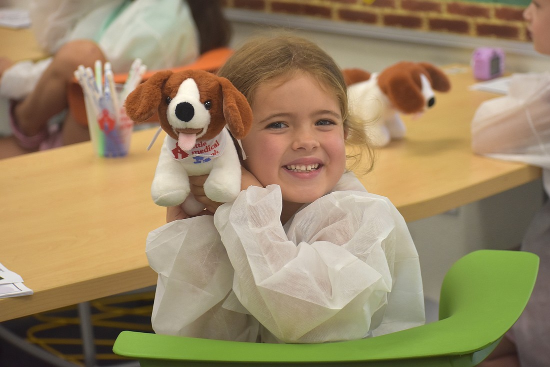 Sienna Linn, a rising first grader at Lakewood Ranch Preparatory Academy, says she has no pets at home but has had a blast with her dog, Mia, at the Little Vet School camp.