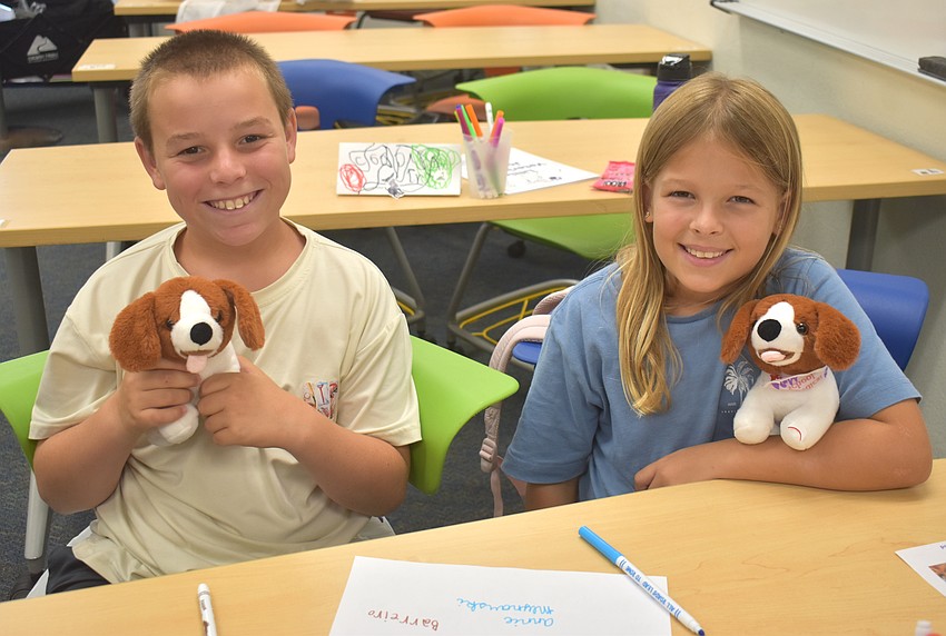 Connor Barreiro, a rising fourth grader at Gene Witt Elementary, and Annie Mlynarski, a rising fourth grader at Sarasota Christian School, are both eager to answer any and all questions at the Little Vet School summer camp.