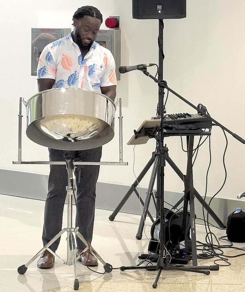 DJ Mello of Mello Vibes Steel Drum Entertainment provided the sound track for SRQ Airport's First Class Flavors tasting event. DJ Mello of Mello Vibes Steel Drum Entertainment provided the sound track for SRQ Airport's First Class Flavors tasting event.