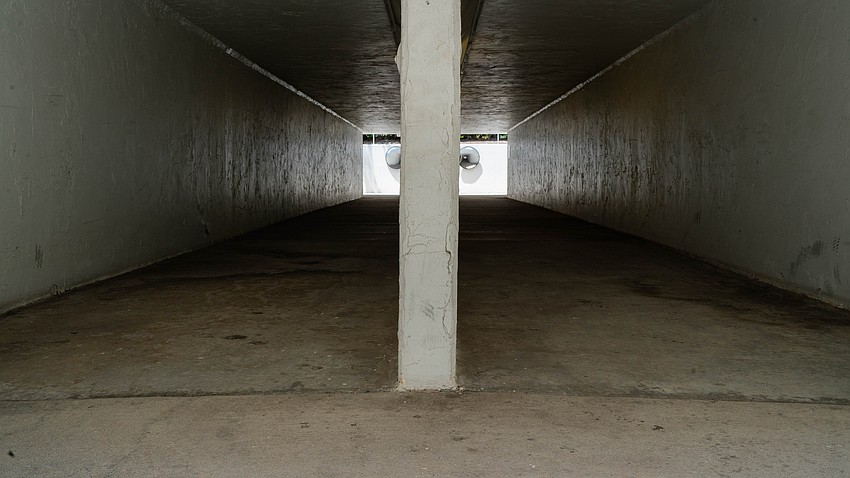 Constructed by the Arvida Corporation in the late 70s, the twin tunnels under Gulf of Mexico Drive were built to accommodate golf carts. Constructed by the Arvida Corporation in the late 70s, the twin tunnels under Gulf of Mexico Drive were built to accommodate golf carts.