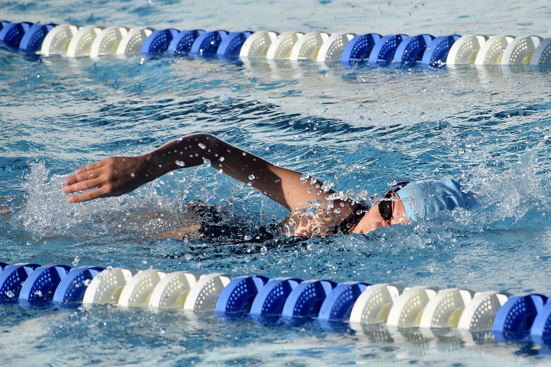 During a drop-in practice, 11-year-old Cara Johnston swims at the Lakewood Ranch YMCA. Head swim coach Jack Belshe said the Hurricanes have around 35 members, as of June 18, following their May 4 launch.