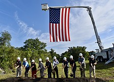 Manatee County staff and key stakeholders toss ceremonial dirt to kick off construction on a half-mile trail segment that will span from the Lake Manatee Water Treatment Plant to Rye Preserver.