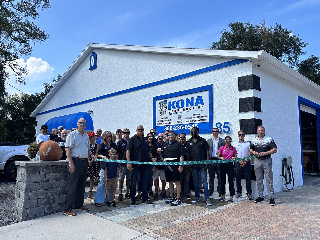 Kona Construction Services celebrates the ribbon cutting of its new Ormond location. Photo by Abbie Pace