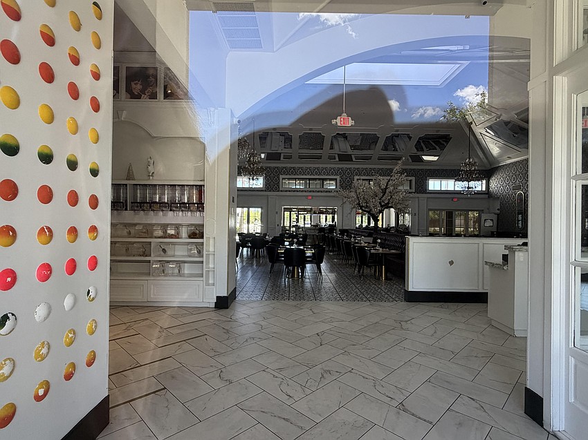 The candy wall and dispensers at the entrance at The Sugar Factory.