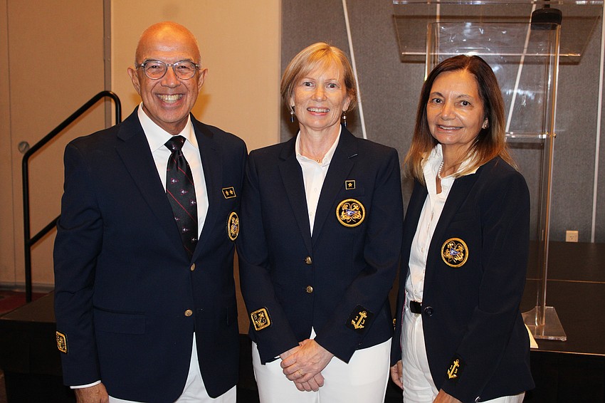 Bird Key Yacht Club Commodore Saul Landesberg, Vice Commodore Lynne Pettigrew and Board Governor Dede Moore celebrate the installation of new leaders at the June 20 change of watch.