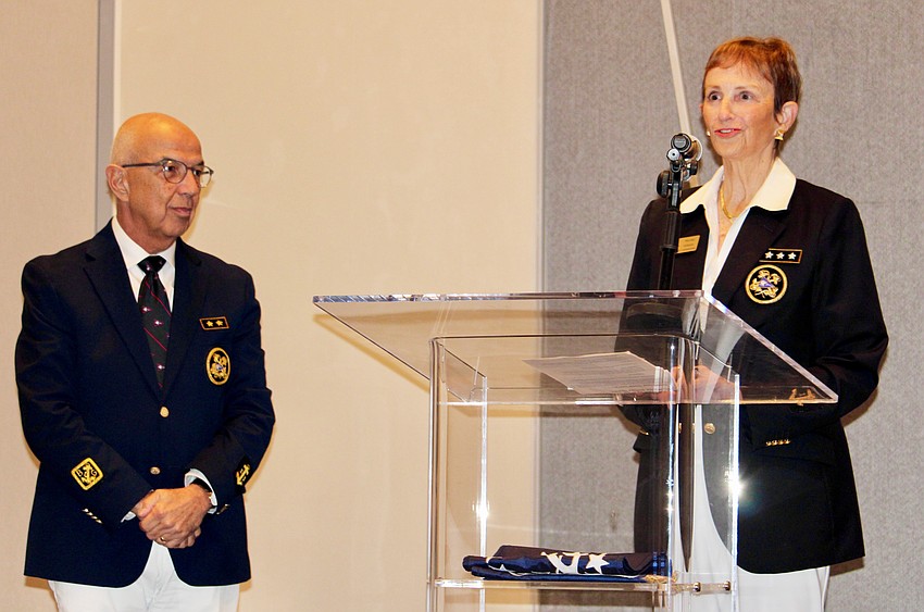 Past Commodore Martha Schantz swears in new Bird Key Yacht Club Commodore Saul Landesberg for Watch Year 2026-27.