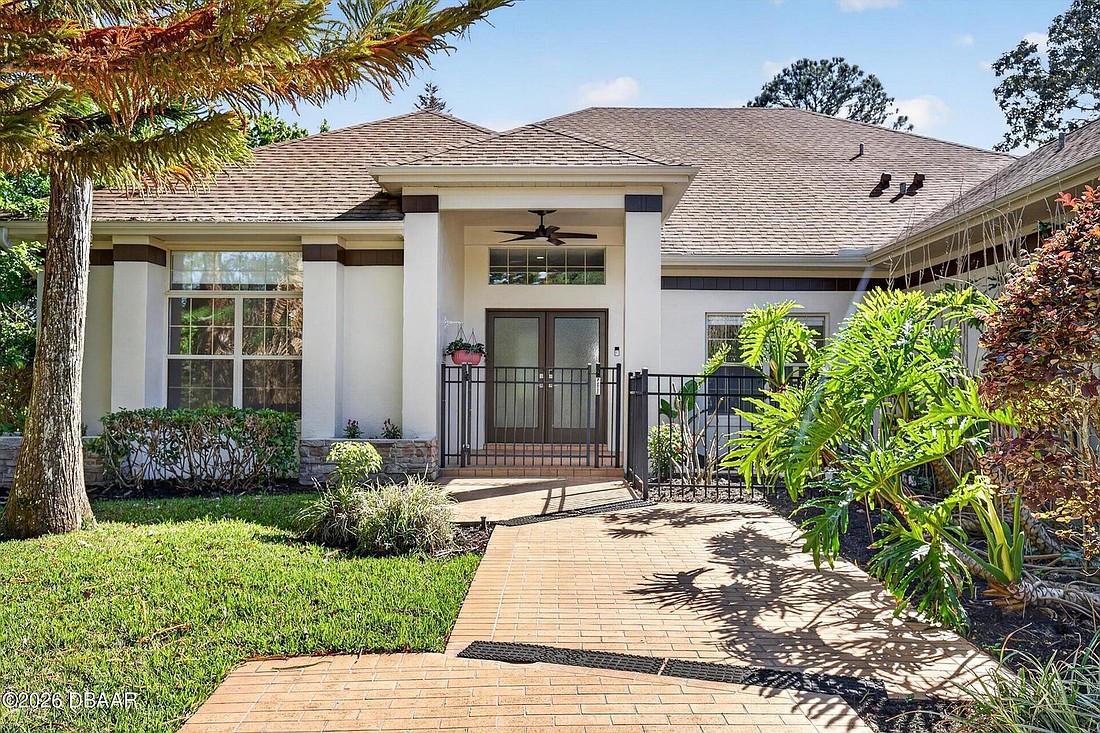Built in 1988, the house at 21 Forest View Way is a 4/3 and has two fireplaces, a pool, a spa and 2,837 square feet. Photo courtesy of Adams, Cameron and Co. Realtors