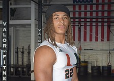 CJ Obaseki flexed his skills as a running back for Miami on June 17. Coach Mario Cristobal and his staff evidently loved what they saw.