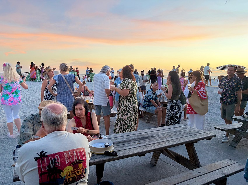 Residents of Lido Key, St. Armands Key and beyond close out the reopening celebration watching the sunset.