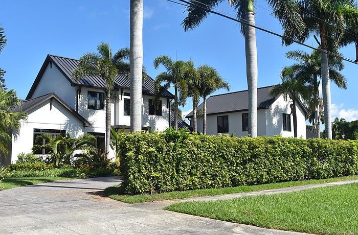 The first property at 5035 Bay Shore was built in 1951 and has two bedrooms, four-and-a-half baths, a pool and 5,096 square feet of living area. The second property was built in 1951 and has one bedroom, one bath and 330 square feet of living area. The third property was built in 2025 and has one bedroom, one bath and 616 square feet of living area.