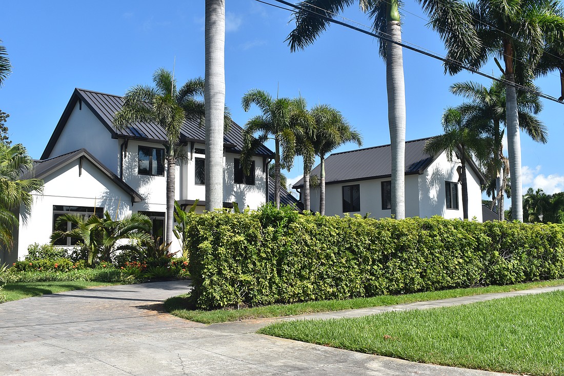 The first property at 5035 Bay Shore was built in 1951 and has two bedrooms, four-and-a-half baths, a pool and 5,096 square feet of living area. The second property was built in 1951 and has one bedroom, one bath and 330 square feet of living area. The third property was built in 2025 and has one bedroom, one bath and 616 square feet of living area.
