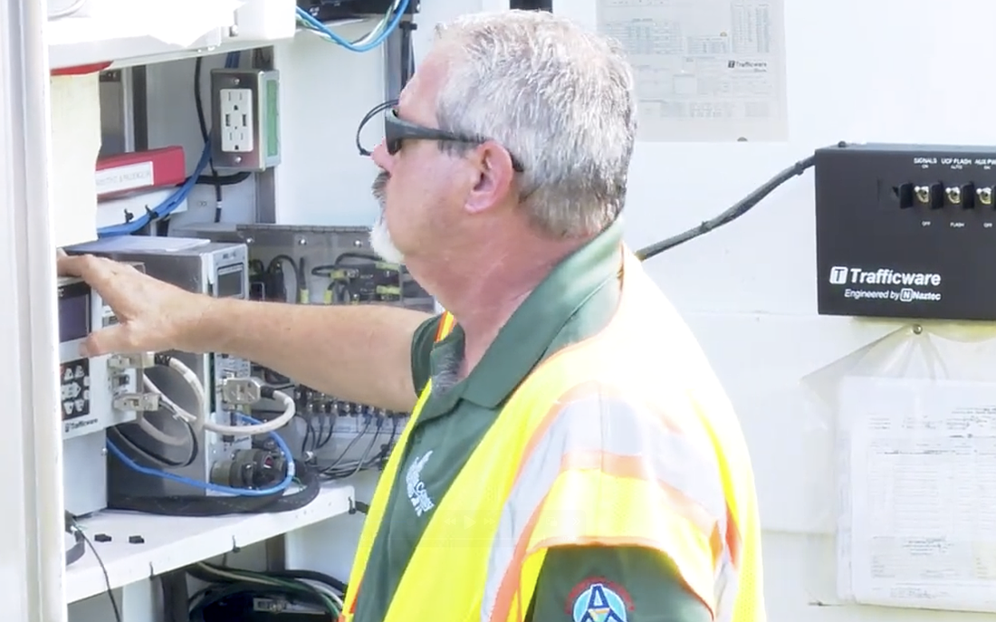 Stephen Smagacz, Supervisor of Streetlights and Signalization for Sarasota County, checks on the proper operation of streetlights along 17th Street.