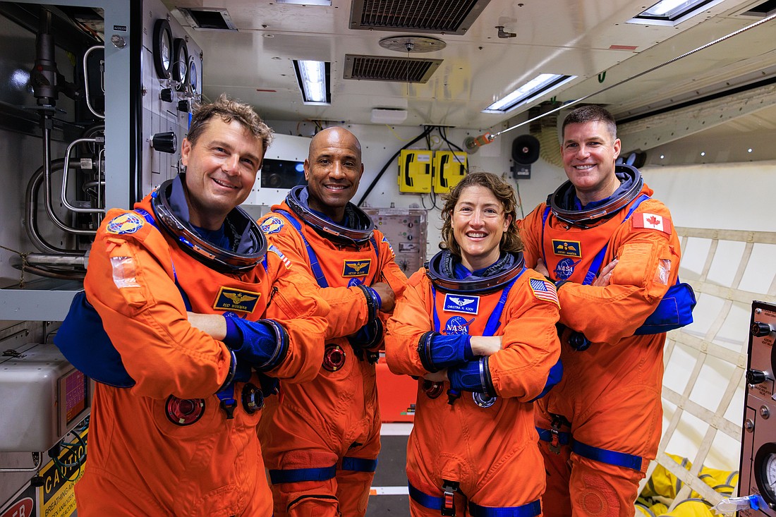 Artemis II NASA astronauts Reid Wiseman, Victor Glover, and Christina Koch, and Canadian Space Agency astronaut Jeremy Hansen stood in the white room on the crew access arm of the mobile launcher at Launch Pad 39B as part of an integrated ground systems test at Kennedy Space Center.
