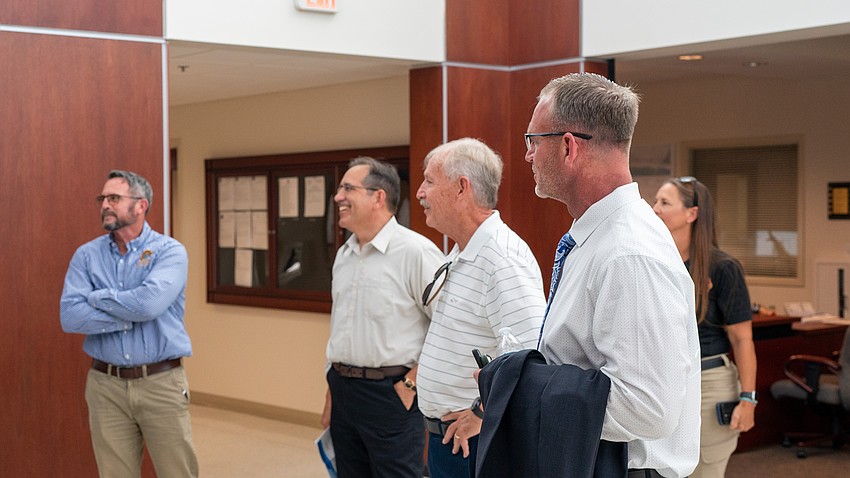 From left to right: Public Works Director Charlie Mopps, Assistant Town Manager Isaac Brownman, outgoing Town Manager Howard Tipton and incoming Town Manager George Landry at Longboat Key Town Hall Tuesday, June 23. Landry traveled to the island to meet with staff and commissioners the day after Town Commission approved the contract to make Landry Tipton’s successor.