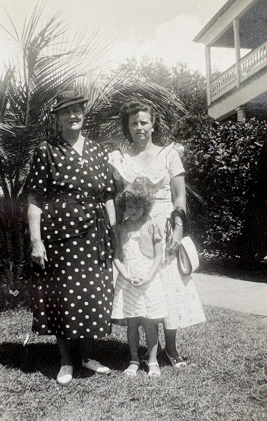 Three generations of Mary Francis Fischer Howard’s family dressed up for a photo. With the little girl are her mother, Mary Fischer, right, and grandmother, Lenora Mach.