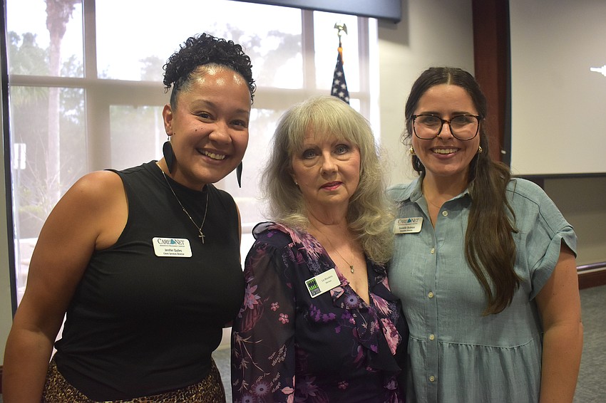 Jenifer Quiles, Sisterhood for Good Grants Co-chair Liz Brookins and Danielle DeJesus celebrate the $3,000 grant for Care Net Manasota Pregnancy Center which will provide basic necessities for 15-20 new moms and babies.