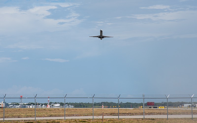 An American Airlines flight takes off from Sarasota-Bradenton International Airport runway 32 Wednesday, June 24.