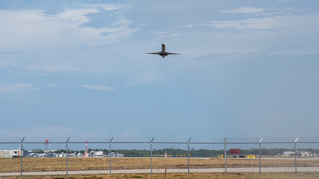 An American Airlines flight takes off from Sarasota-Bradenton International Airport runway 32 Wednesday, June 24.