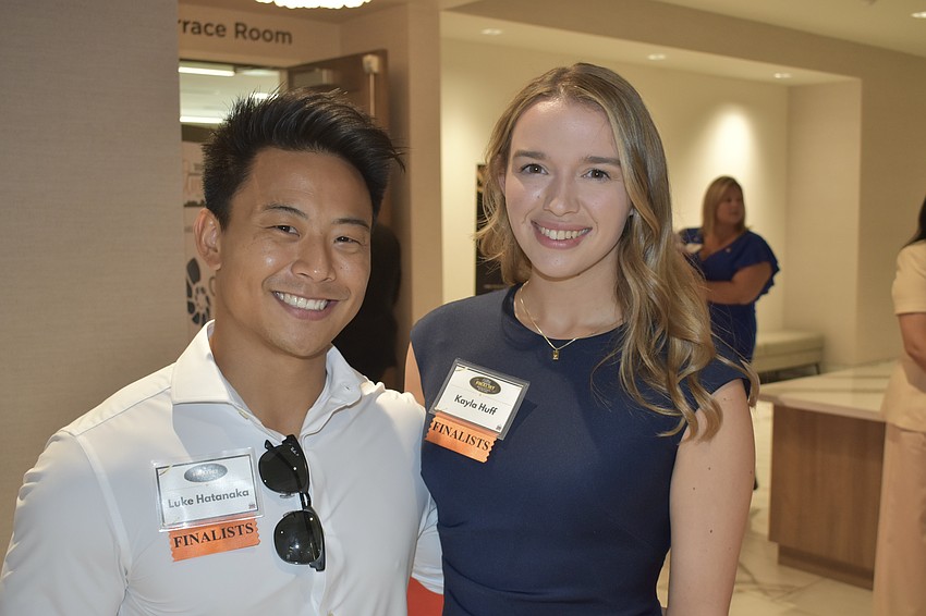 Luke Hatanaka and his girlfriend Kayla Huff of Jesse's Garage European Auto Repair, a finalist for the Medium Business of the Year award, pose together.