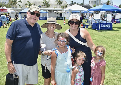 Gary St. Clair, his wife Elizabeth St. Clair, granddaughter Avianna Pereira, 7, daughter Allison Pereira, and granddaughters Adley Pereira, 5, and Amelia Pereira, 6, enjoy Sarasota Key Quest Fest.