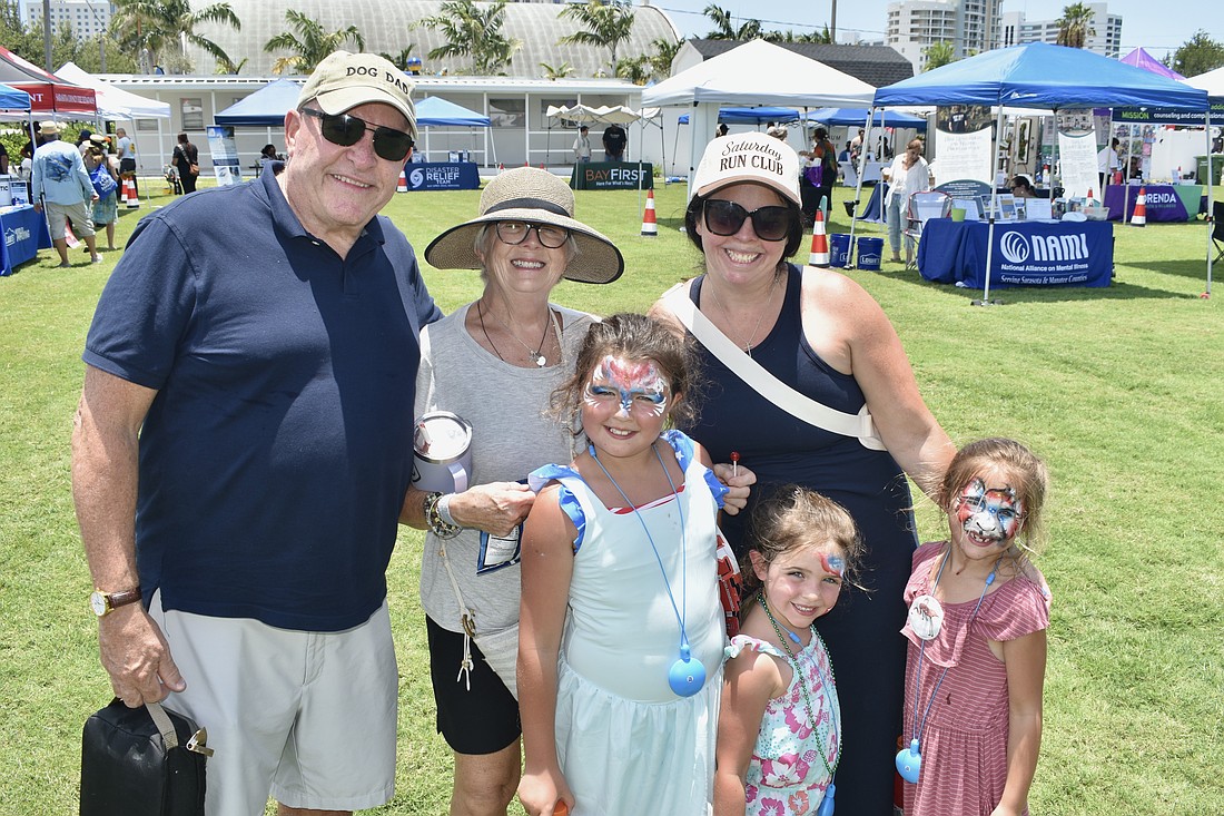 Gary St. Clair, his wife Elizabeth St. Clair, granddaughter Avianna Pereira, 7, daughter Allison Pereira, and granddaughters Adley Pereira, 5, and Amelia Pereira, 6, enjoy Sarasota Key Quest Fest.