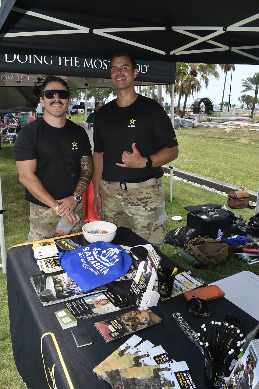 Staff Sergeant Jose Castaneda and Sergeant First Class Edwin Fernandez greeted visitors at the U.S. Army table.