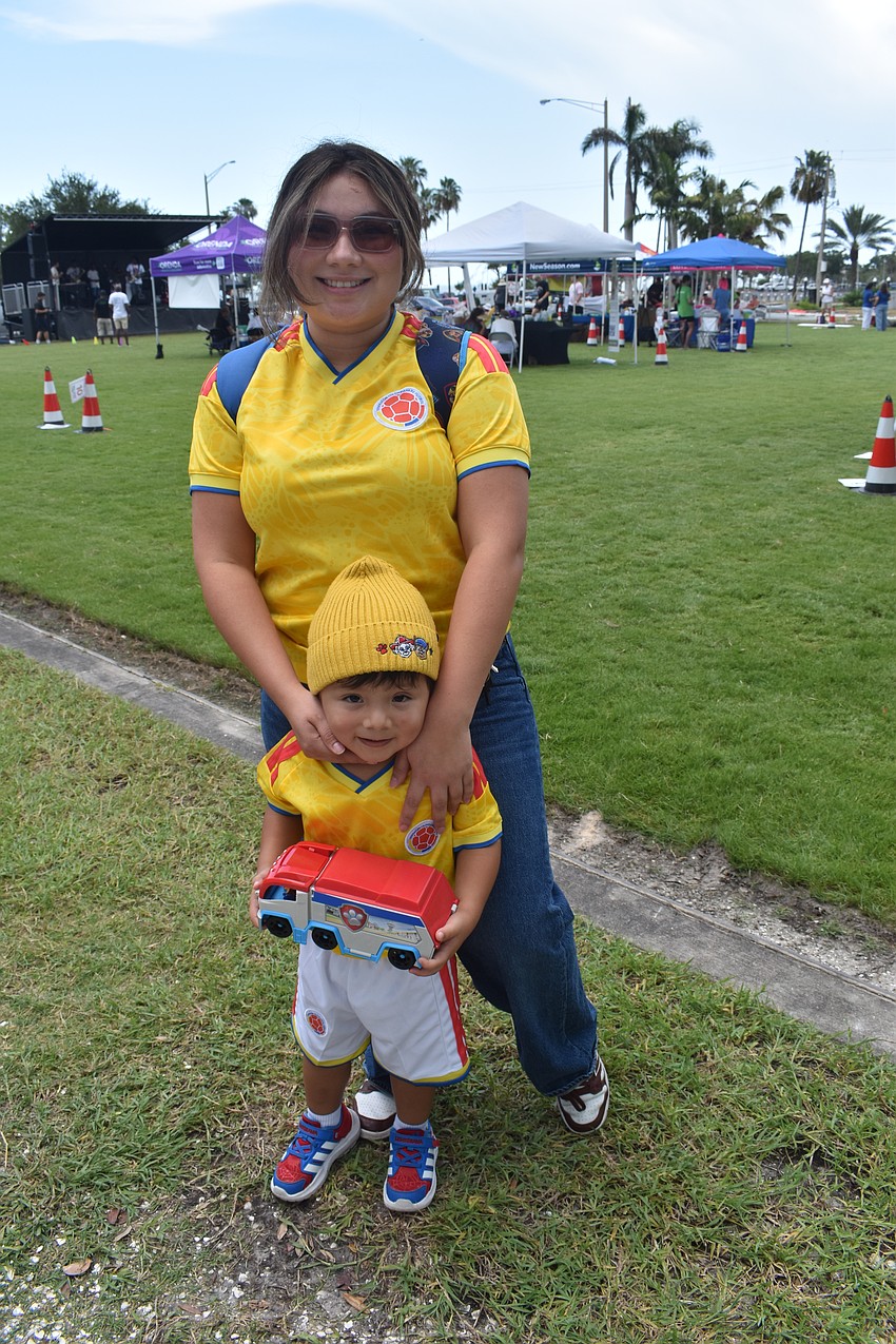 Valentina Lopez and her son Joshua Romero, 3, represented Colombia's football team.