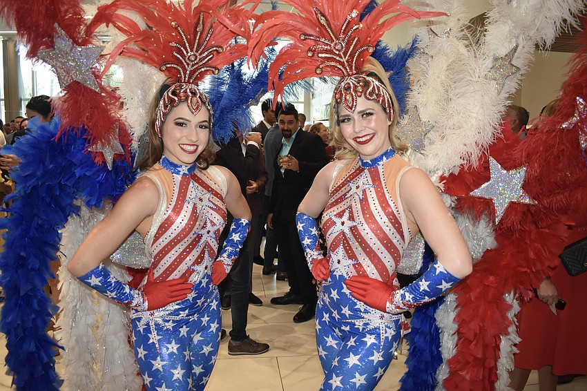 Tatiana Hernandez and Gina Wojciechowski bring some patriotic colors to the reception.