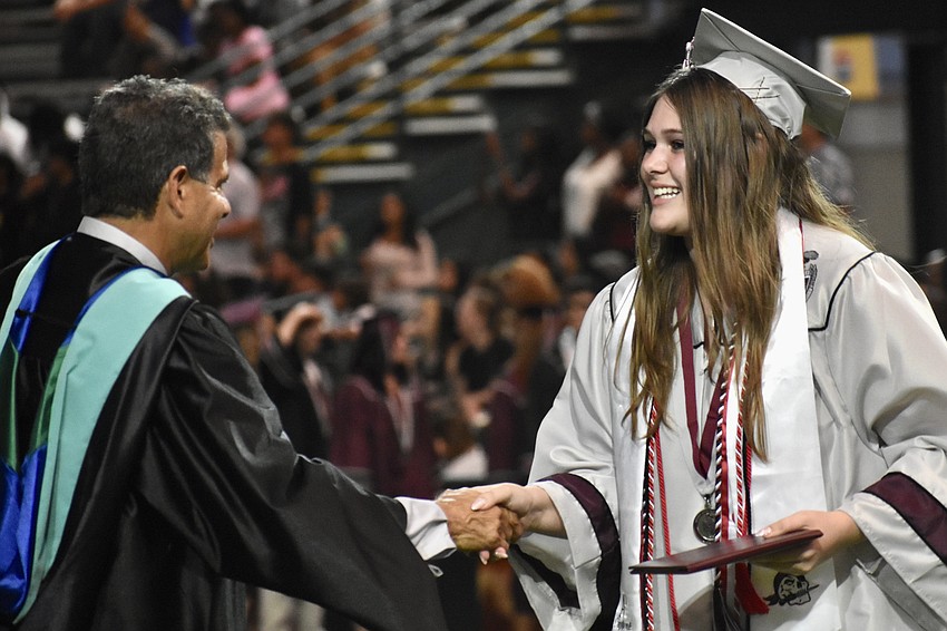 Matt Nesser (left), pictured here with 2026 Braden River High graduate Kylie Mohamed (right), is entering his 13th year as the school's athletic director.