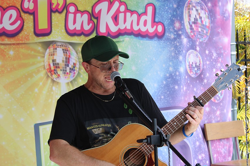 George Parmelee keeping everyone entertained guest at the annual Hot Dog Day event.