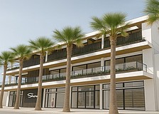 A rendering of the planned Shore restaurant, boutique, cafe and residential space as viewed from Boulevard of the Presidents on St. Armands Circle.