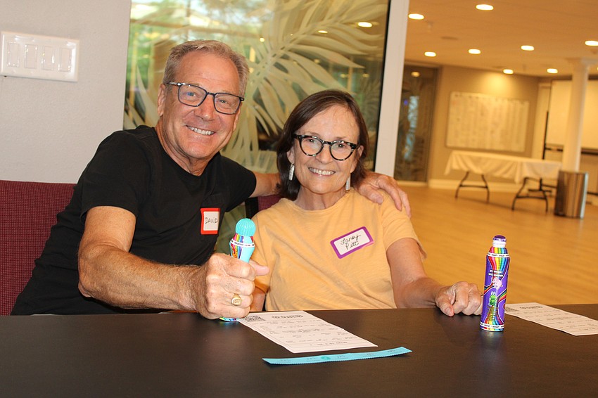 David and Laney Pitt join in a game of 'singo' at The Paradise Center. The clues for that round included hit tunes from the '70s.