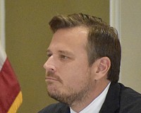 State Rep. James Buchanan was one of the driving forces behind a one-year accommodation in a state tax bill that requires either county governments to cover any fees associated with collecting voter-approved school taxes or to waive those fees.