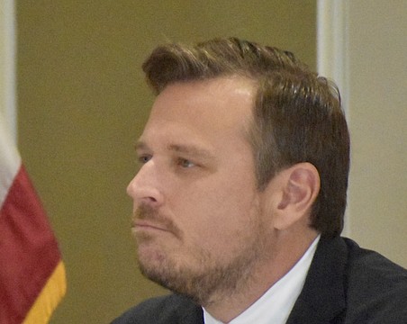 State Rep. James Buchanan was one of the driving forces behind a one-year accommodation in a state tax bill that requires either county governments to cover any fees associated with collecting voter-approved school taxes or to waive those fees.