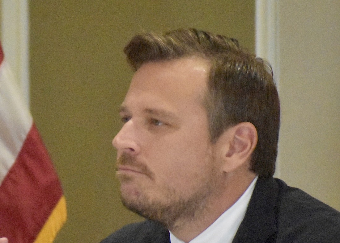 State Rep. James Buchanan was one of the driving forces behind a one-year accommodation in a state tax bill that requires either county governments to cover any fees associated with collecting voter-approved school taxes or to waive those fees.