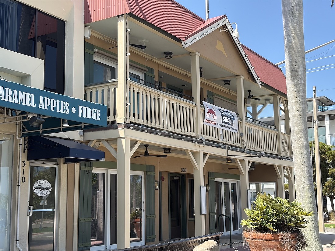 A Pinchers "coming soon" sign appears at 300 John Ringling Blvd. on St. Armands Circle in Sarasota.