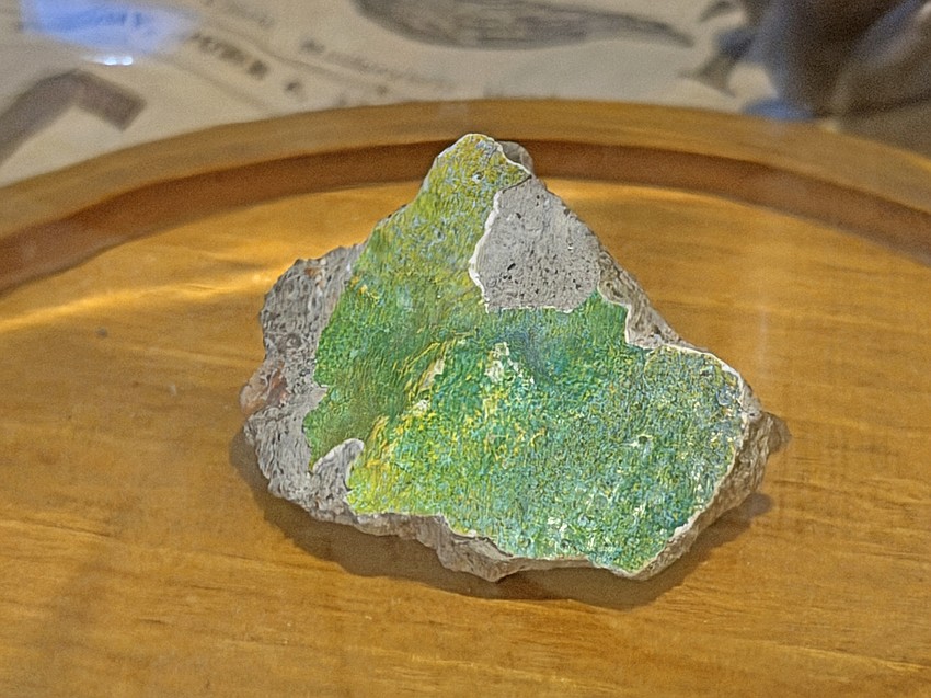 A piece of the narrowest section of the Berlin Wall is on display in the room as a symbolism for the fragility of freedom.