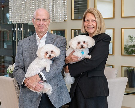 Drs. Joel and Gail Morganroth could be often seen dotting on their dogs, Brandy and Bentley. The couple is seen here at the Siesta Key home in early 2025.