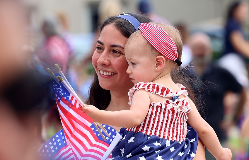 Last year, Lila Miller, 10 months at the time, enjoyed the Winter Garden All-American Kids Parade & Pancake Breakfast with her mom, Ale.