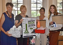 Deborah Callahan-Stratton, Joy Stone, Barbara Najmy and Jennifer Alokeh are collecting sneakers for the fifth annual Sneakin Back to School Sneaker Drive to benefit The Twig.