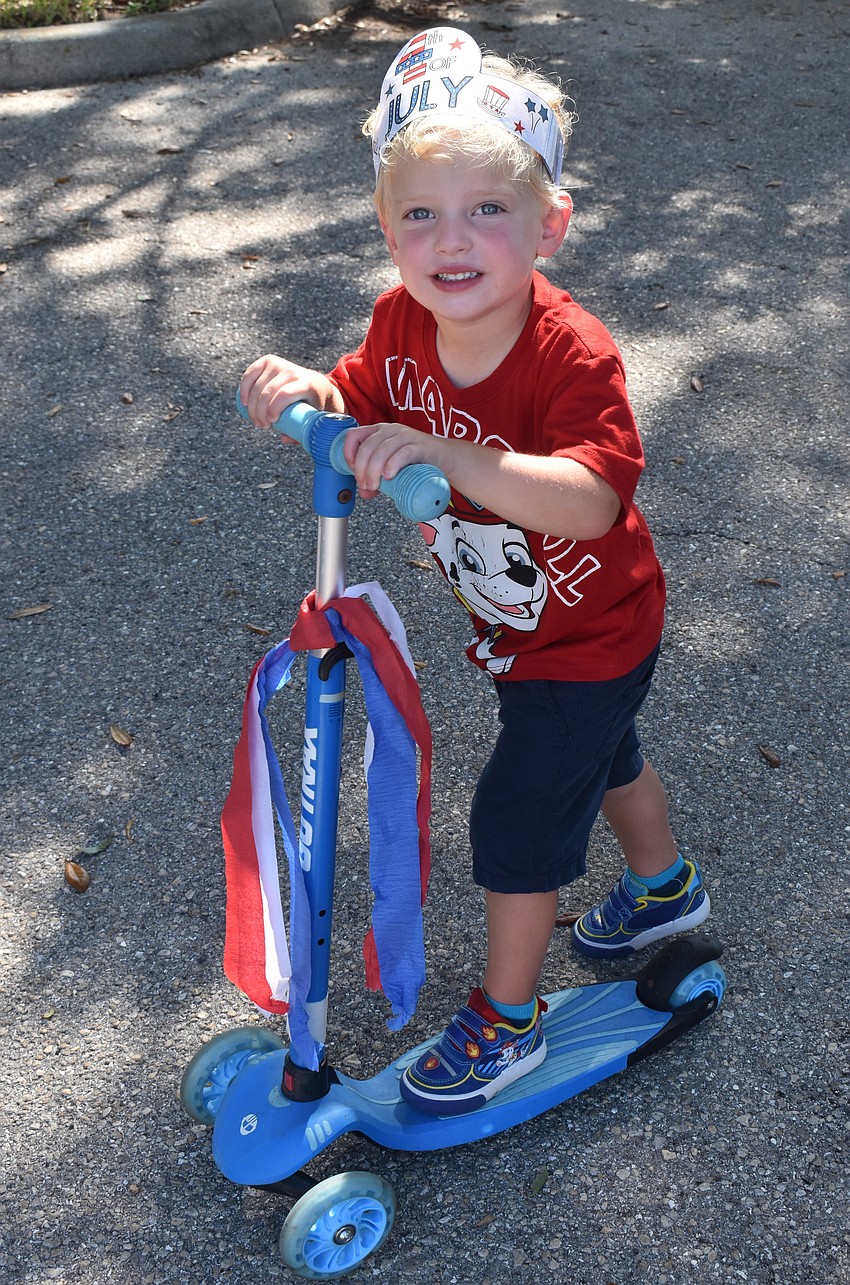 Marvin Jakob Lara, 3, is excited to ride in the parade because he missed the event last year.