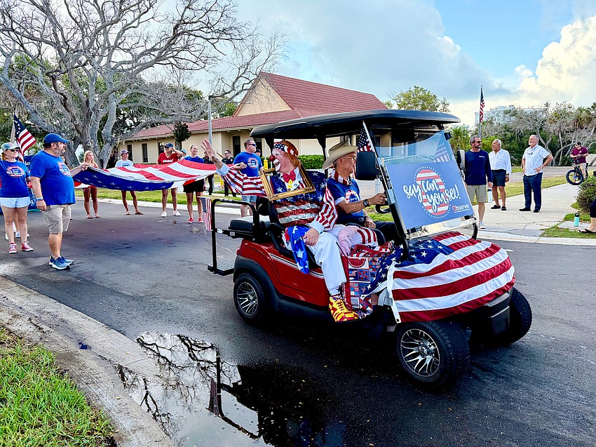 Chucko the Clown, a staple entertainer at Longboat Key's Freedom Fest, gives the signal to start marching at the Fourth of July parade.