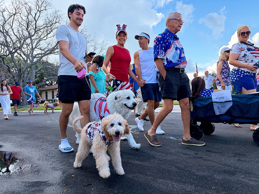 Dogs of all sizes took a break from the dog park to join the 'Hot Diggity Dog' costume contest.
